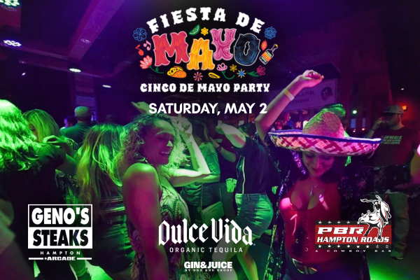 two ladies dancing with their hands raised energetically in the air at fiesta de de mayo at pbr hampton